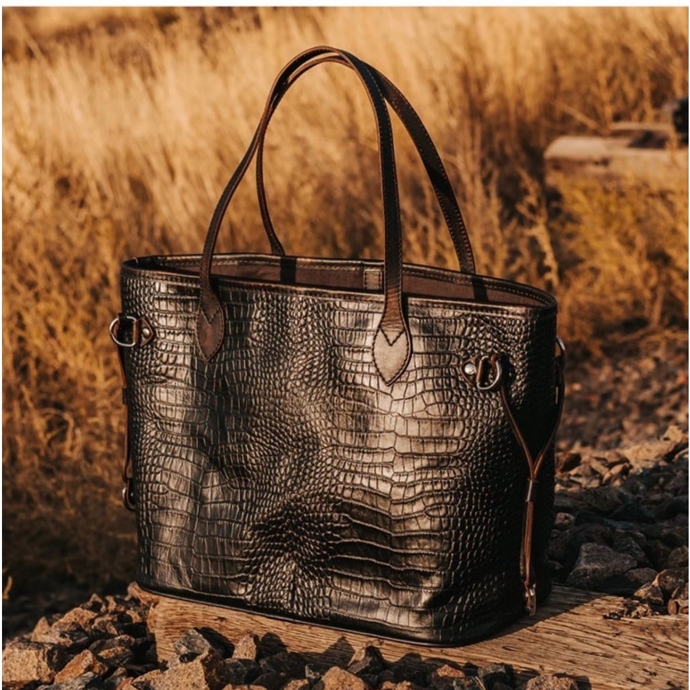 perfect tote bag is made with 100% leather . 
17  x  11 ¼  x  7 ¼